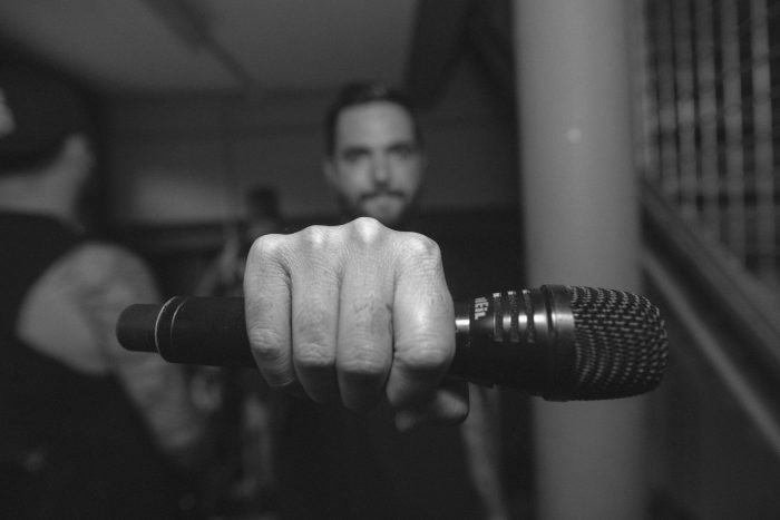 Before the show, always a fist pound - but only after mic is in hand